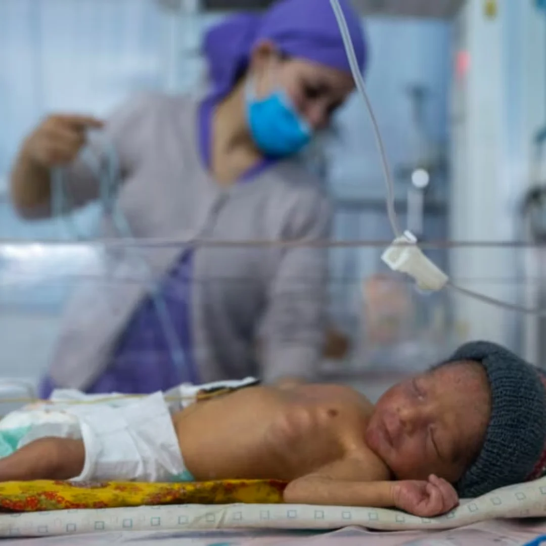 Healthcare workers providing maternal care in Afghanistan
